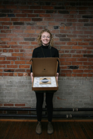 An image of myself holding an opened CONTACT kit.