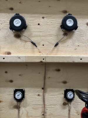 Four transducers on the bottom of a vibrating wheelchair platform.