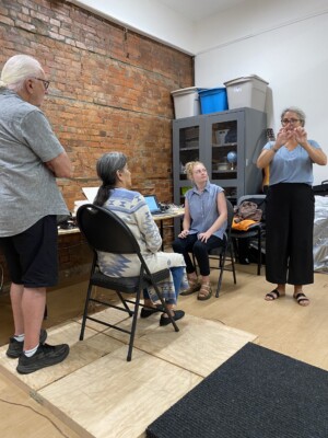 Debbie using ASL interpretation to Marsha about what I have said.